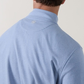 Model wearing Peter Millar Ardent Air Half-Zip Sweatshirt in Lakeside, close-up of back neckline showing funnel neck and small logo detail.