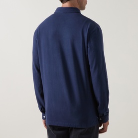 Model wearing Peter Millar navy long-sleeve polo sweat, back view, relaxed fit in cotton-spandex blend.