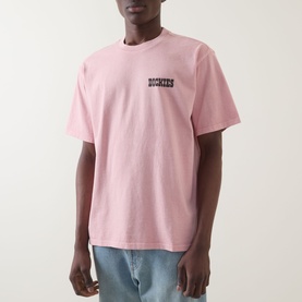 Model wearing Dickies Bridal Rose crew neck T-shirt with small chest logo, styled with light blue jeans.