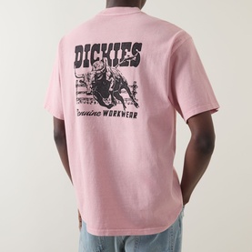 Model wearing Dickies Crew Neck T in Bridal Rose with graphic cowboy print and Genuine Workwear branding on back.