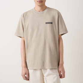 Model wearing Dickies Darrtown Logo T-Shirt in Eucalyptus, crew neck with chest logo detail, styled with cream trousers.