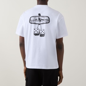 Model wearing Dickies white crew neck T-shirt, back view, with rear-view mirror and dice graphic print.