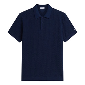 Tommy Hilfiger Carbon Navy short-sleeve polo shirt with textured knit fabric, three-button placket, and small logo detail