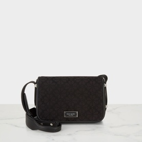Kate Spade black multi monogram crossbody bag with silver-tone logo plaque, flap closure, and adjustable leather strap