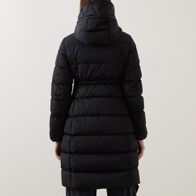 Model wearing Moncler black quilted down coat, rear view, high collar and belted waist, knee-length silhouette
