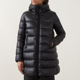 Model wearing Moncler black quilted down parka with hood, glossy finish and zip front fastening, mid-length silhouette