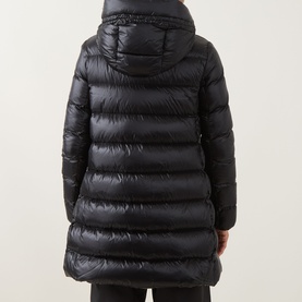 Model wearing Moncler black quilted down parka, rear view, hooded, glossy finish, mid-length silhouette