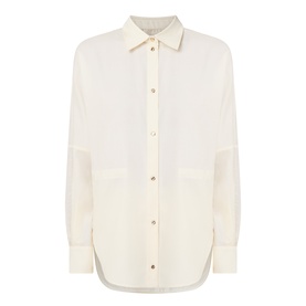 Moncler cream shirt with point collar, gold-tone buttons, chest patch pockets, and mixed wool and polyamide panelling