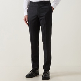 Model wearing Paul Smith charcoal wool-cashmere formal trousers, styled with a white shirt and black leather shoes.