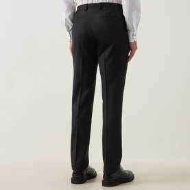 Model wearing Paul Smith charcoal wool-cashmere formal trousers, rear view, styled with a white shirt and black leather shoes.