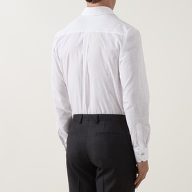 Model wearing Paul Smith white slim fit single cuff formal shirt, back view, paired with dark grey trousers