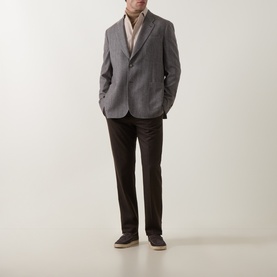 Model wearing Paul Smith charcoal wool-cashmere blazer jacket, styled with beige shirt and dark brown trousers.