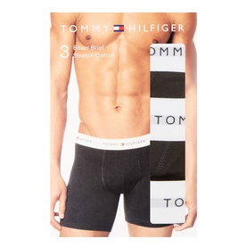 Tommy Hilfiger Three-Pack Signature Logo Boxer Briefs in black with white elasticated logo waistband, shown on model and packaged.