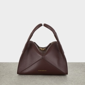 Victoria Beckham Dark Burgundy calf leather crossbody bag with structured triangular panels and gold-tone clasp hardware