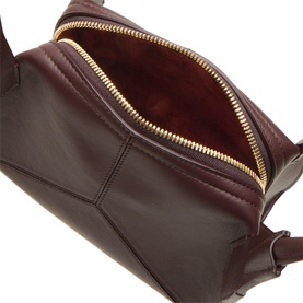 Victoria Beckham Dark Burgundy calf leather crossbody bag, open showing red suede lining and gold zip fastening