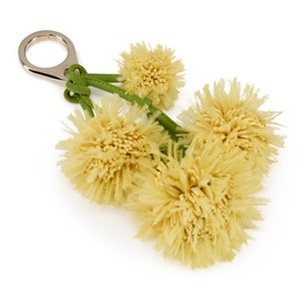 Christian Louboutin bag charm featuring cream fluffy pom-pom flowers on green stems with silver keyring clip