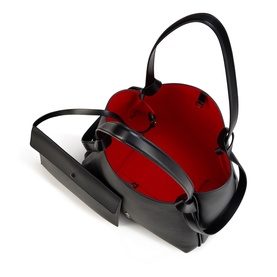 Christian Louboutin black leather bucket bag with red interior lining, single top handle and removable flat base, overhead view