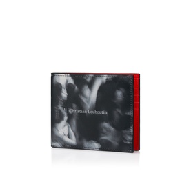 Christian Louboutin bifold wallet in black and white with graphic print, red leather interior and contrast red edge trim