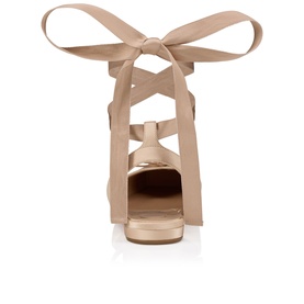 Christian Louboutin blush patent leather heeled sandal, rear view, with wrap-around ribbon ankle ties and open toe