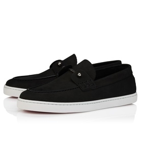 Christian Louboutin black suede slip-on loafer sneakers with perforated detail, white sole, and signature red sole visible at base.