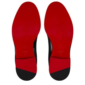 Christian Louboutin black men's shoes sole view, featuring signature red lacquered outsole with heel detail