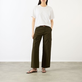Model wearing Citizens of Humanity Moss straight cargo trousers with white T-shirt and black strappy sandals.