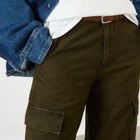 Model wearing Citizens of Humanity Moss straight cargo trousers with brown belt, styled with white tee and denim jacket