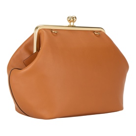 Coach Kisslock Large Frame Bag in amber brown leather with gold-tone kisslock frame closure and detachable strap, angled view