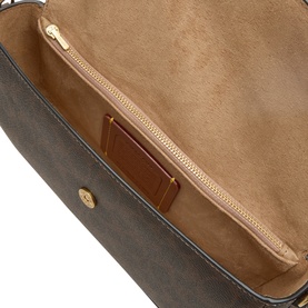 Coach Maple crossbody bag interior, showing suede lining, gold-tone zip pocket and tan leather card slot