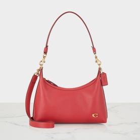Coach crossbody bag in Poppy red leather, gold-tone hardware and Coach logo charm, single shoulder strap with detachable crossbody strap