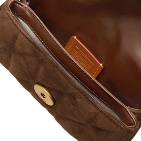 Coach Tabby 19 Quilted Suede Crossbody Bag in Dark Chocolate, close-up of open interior and gold-tone magnetic button closure