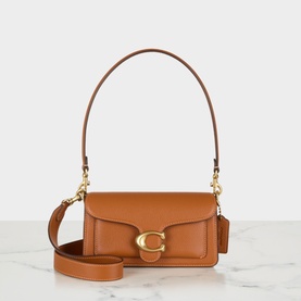 Coach Tabby 20 Shoulder Bag in amber pebbled leather, gold-tone C logo hardware, flap closure, single top handle and detachable crossbody strap