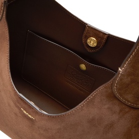 Coach Dark Chocolate suede shoulder bag interior view showing tan fabric lining, card slot, and gold-tone snap fastening detail