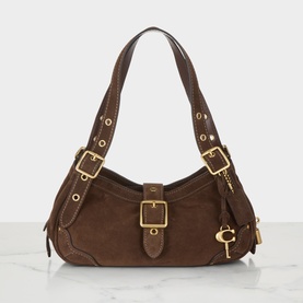 Coach dark chocolate leather shoulder bag with gold-tone hardware, buckle detail, eyelet straps, and key charm pendant