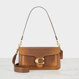 Coach dark brown leather shoulder bag with gold-tone C hardware clasp, single top handle and detachable crossbody strap