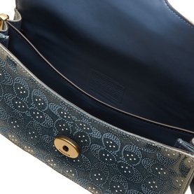 Coach Tabby 26 Denim Embellished Shoulder Bag in denim, open interior view showing blue lining and gold-tone magnetic snap closure