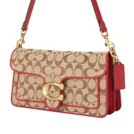 Coach shoulder bag in Poppy Signature, tan jacquard fabric with red leather trim, gold-tone C buckle hardware and adjustable strap