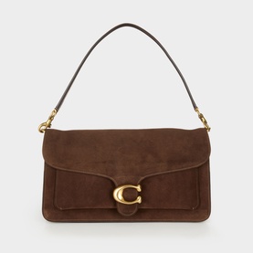 Coach Tabby shoulder bag in dark brown suede with gold-tone C clasp closure and single top handle