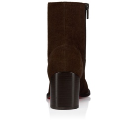 Christian Louboutin dark brown suede ankle boot, rear view showing block heel, back zip fastening and signature red sole detail.
