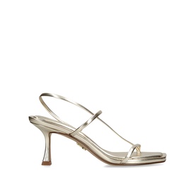 Gold metallic strappy slingback sandal with square toe, thin toe-strap detailing, and sculpted mid heel on white background.