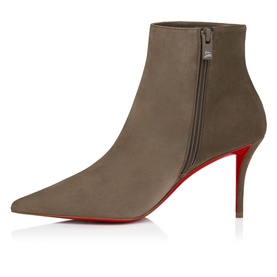 Christian Louboutin green suede pointed-toe ankle boot with side zip, stiletto heel, and signature red sole