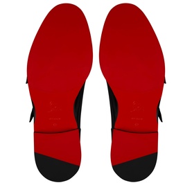 Christian Louboutin black men's shoes showing iconic red lacquered soles, overhead flat lay view of both outsoles.
