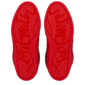 Christian Louboutin red sneaker soles, featuring embossed cursive branding across both outsoles in tonal red.