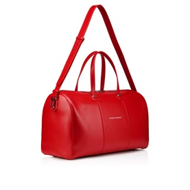 Christian Louboutin red smooth leather duffle bag with dual top handles, detachable shoulder strap, and gold-tone hardware.