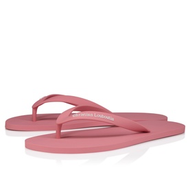 Christian Louboutin flip flops in Bon Bon pink, flat rubber sole with branded thong strap, pair displayed flat
