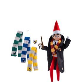 Elf on the Shelf Hogwarts-style elf toy in black robe, red hat and striped scarf, shown with three interchangeable house scarves in multi colours