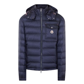 Moncler dark blue quilted down jacket with detachable hood, chest pocket, and logo badge, silver zip fastening