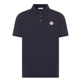 Moncler blue cotton polo shirt with three-button placket, short sleeves, and signature logo patch on chest