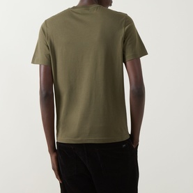 Model wearing Moncler dark green cotton T-shirt, rear view, styled with black trousers