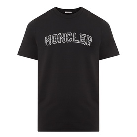 Moncler black cotton T-shirt with bold arched logo lettering in white outline print on chest